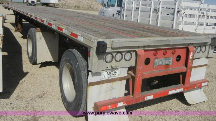 image for item 2217 1997 Talbert 48' flat bed semi trailer