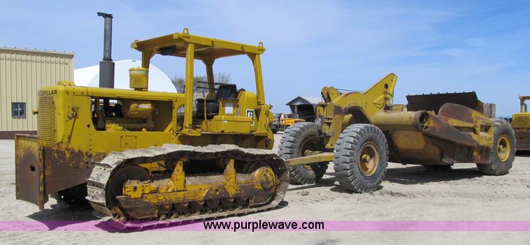 image for item 4144 1976 Caterpillar D6C dozer with towed scraper