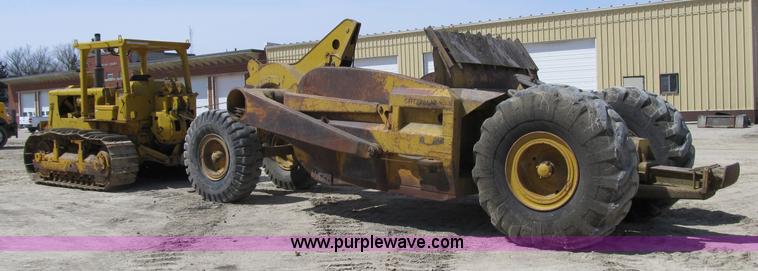 image for item 4144 1976 Caterpillar D6C dozer with towed scraper