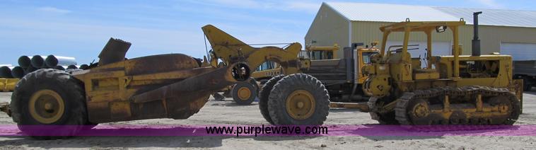 image for item 4144 1976 Caterpillar D6C dozer with towed scraper