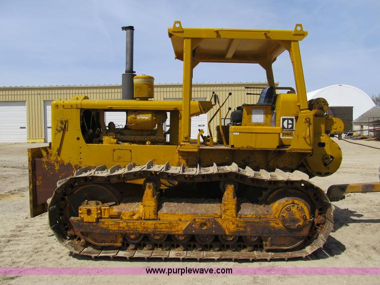 image for item 4144 1976 Caterpillar D6C dozer with towed scraper