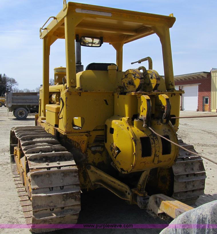 image for item 4144 1976 Caterpillar D6C dozer with towed scraper