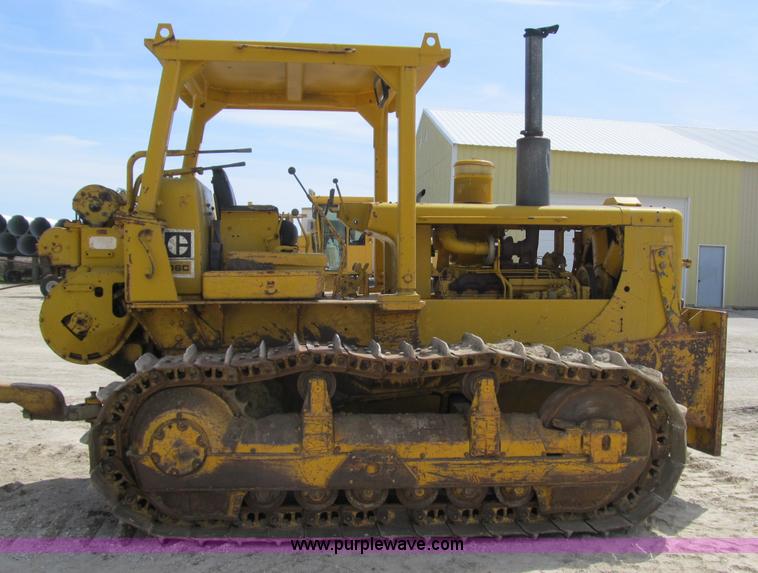 image for item 4144 1976 Caterpillar D6C dozer with towed scraper