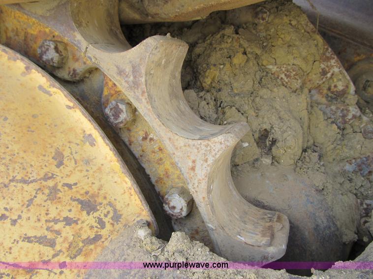 image for item 4144 1976 Caterpillar D6C dozer with towed scraper