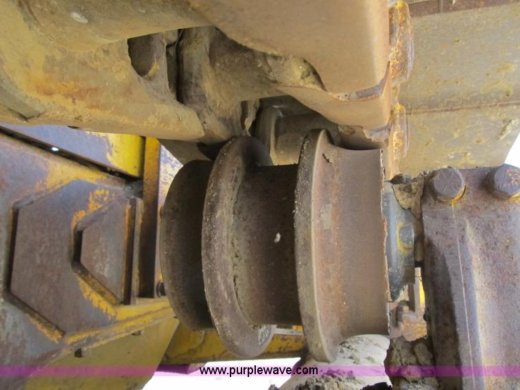 image for item 4144 1976 Caterpillar D6C dozer with towed scraper