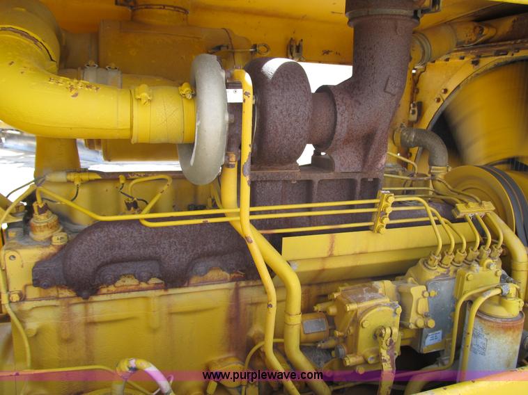 image for item 4144 1976 Caterpillar D6C dozer with towed scraper