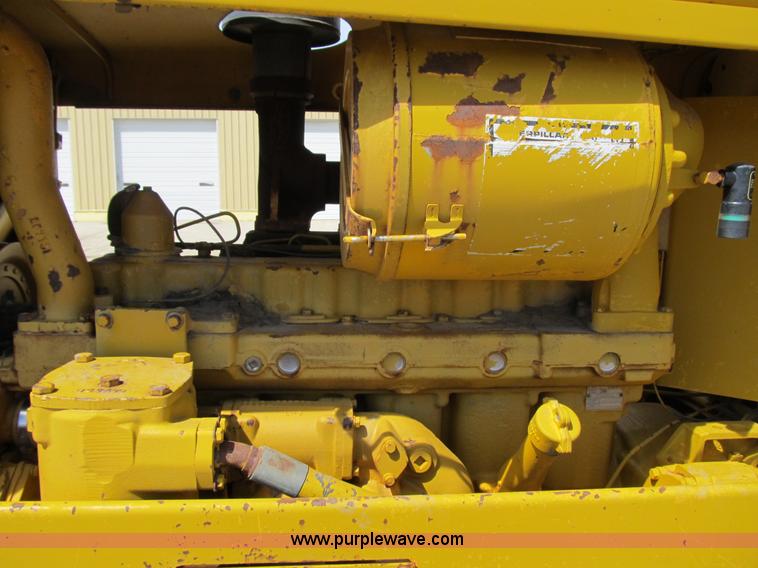 image for item 4144 1976 Caterpillar D6C dozer with towed scraper