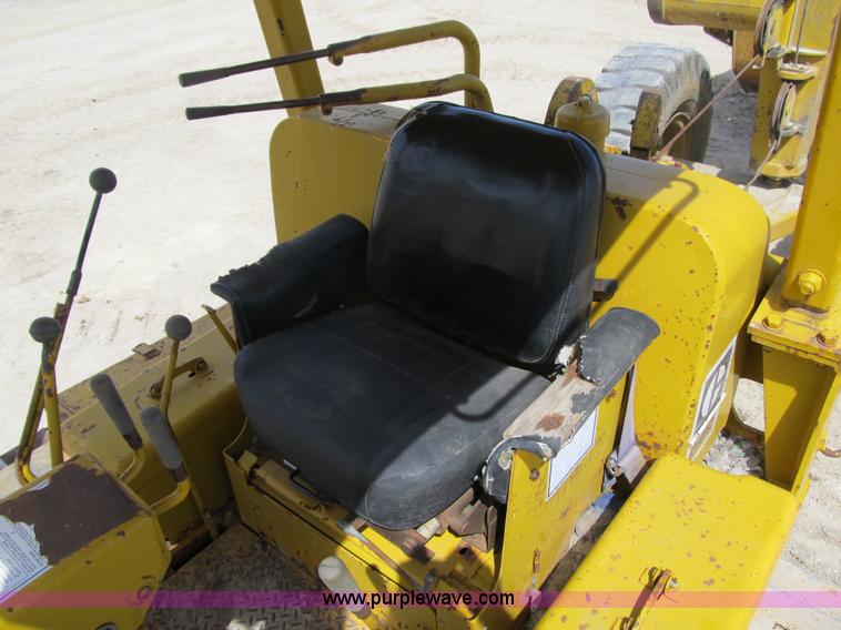 image for item 4144 1976 Caterpillar D6C dozer with towed scraper