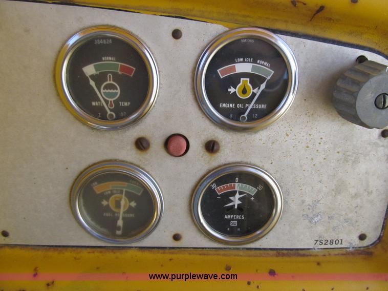 image for item 4144 1976 Caterpillar D6C dozer with towed scraper