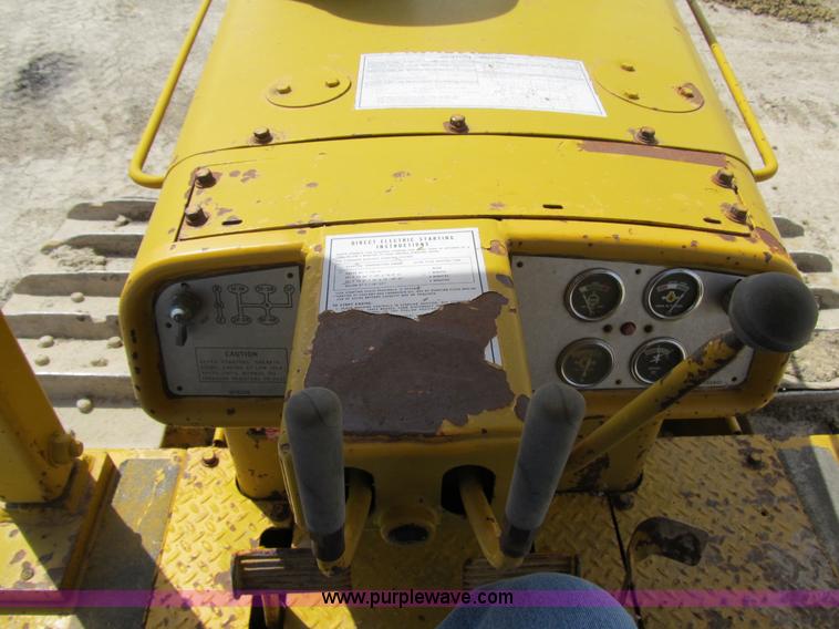 image for item 4144 1976 Caterpillar D6C dozer with towed scraper