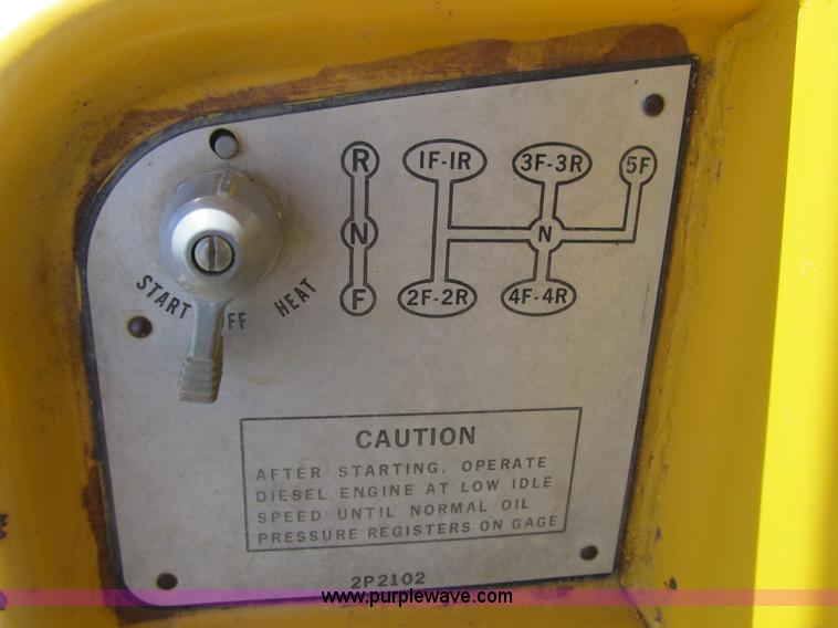 image for item 4144 1976 Caterpillar D6C dozer with towed scraper