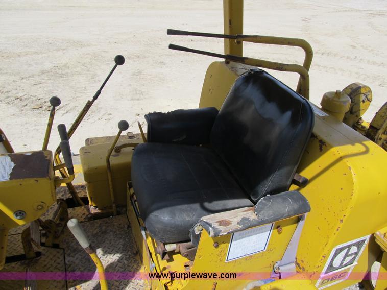 image for item 4144 1976 Caterpillar D6C dozer with towed scraper