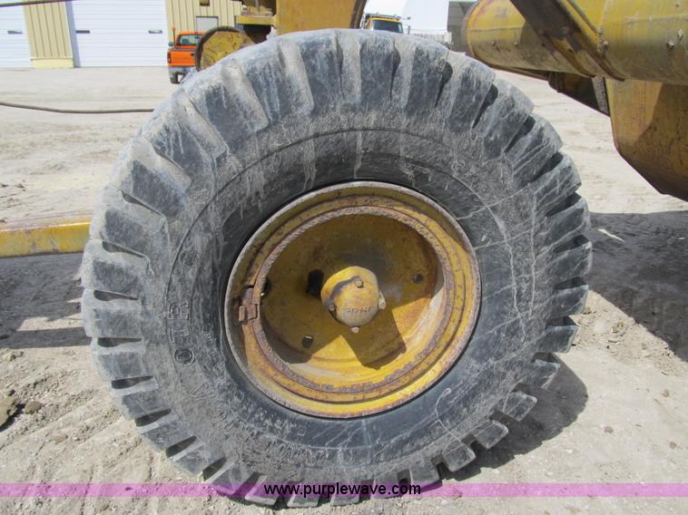 image for item 4144 1976 Caterpillar D6C dozer with towed scraper