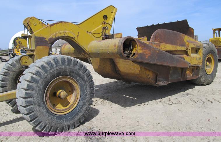 image for item 4144 1976 Caterpillar D6C dozer with towed scraper