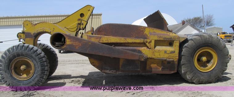 image for item 4144 1976 Caterpillar D6C dozer with towed scraper
