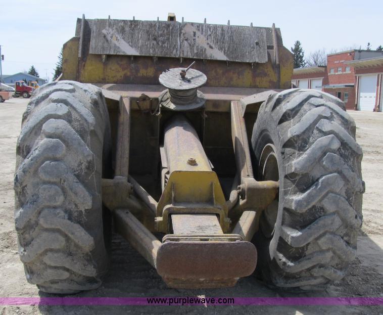 image for item 4144 1976 Caterpillar D6C dozer with towed scraper