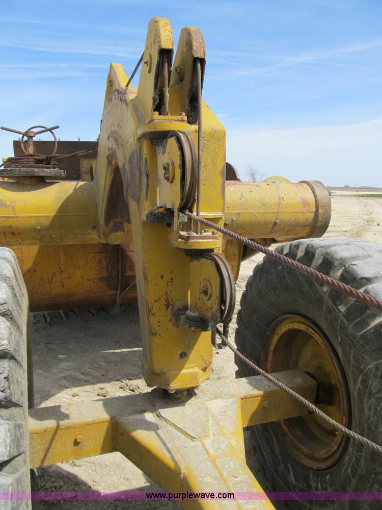 image for item 4144 1976 Caterpillar D6C dozer with towed scraper