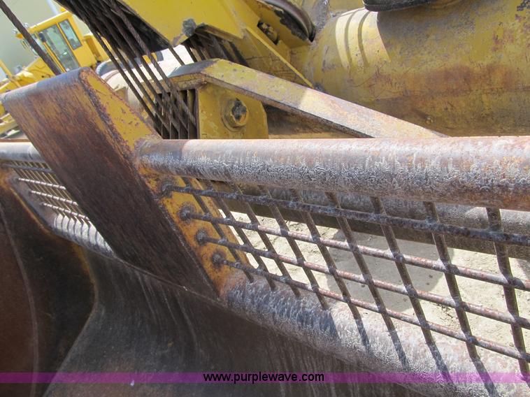 image for item 4144 1976 Caterpillar D6C dozer with towed scraper