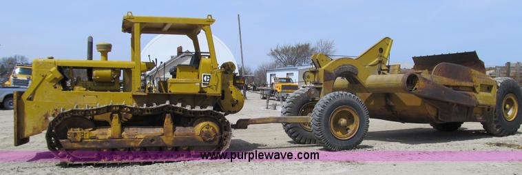 image for item 4145 1971 Caterpillar D6C dozer with towed scraper
