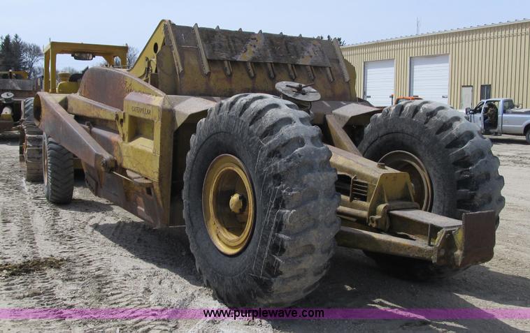 image for item 4145 1971 Caterpillar D6C dozer with towed scraper