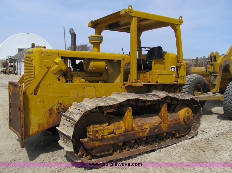 image for item 4145 1971 Caterpillar D6C dozer with towed scraper