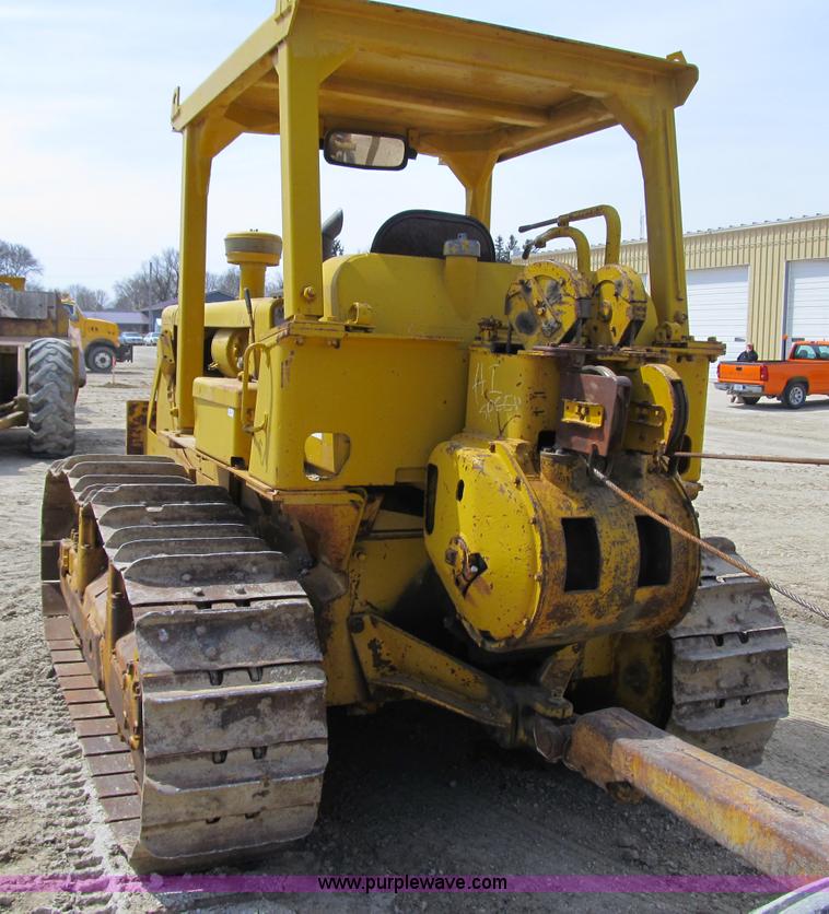 image for item 4145 1971 Caterpillar D6C dozer with towed scraper