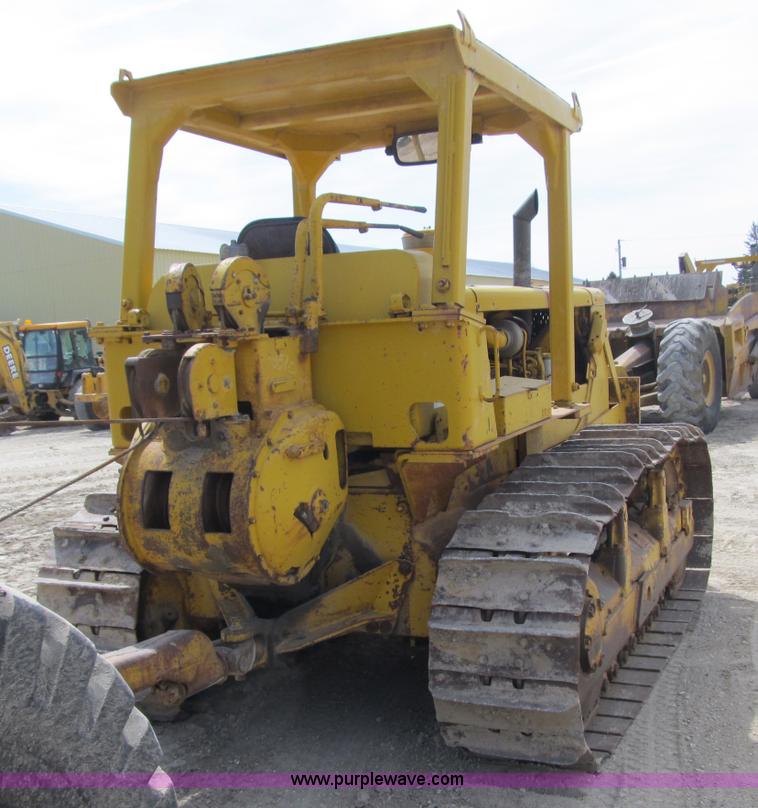 image for item 4145 1971 Caterpillar D6C dozer with towed scraper