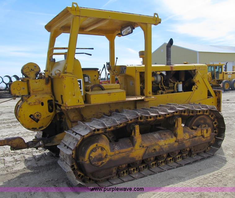 image for item 4145 1971 Caterpillar D6C dozer with towed scraper
