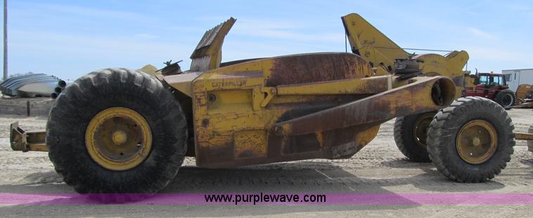 image for item 4145 1971 Caterpillar D6C dozer with towed scraper