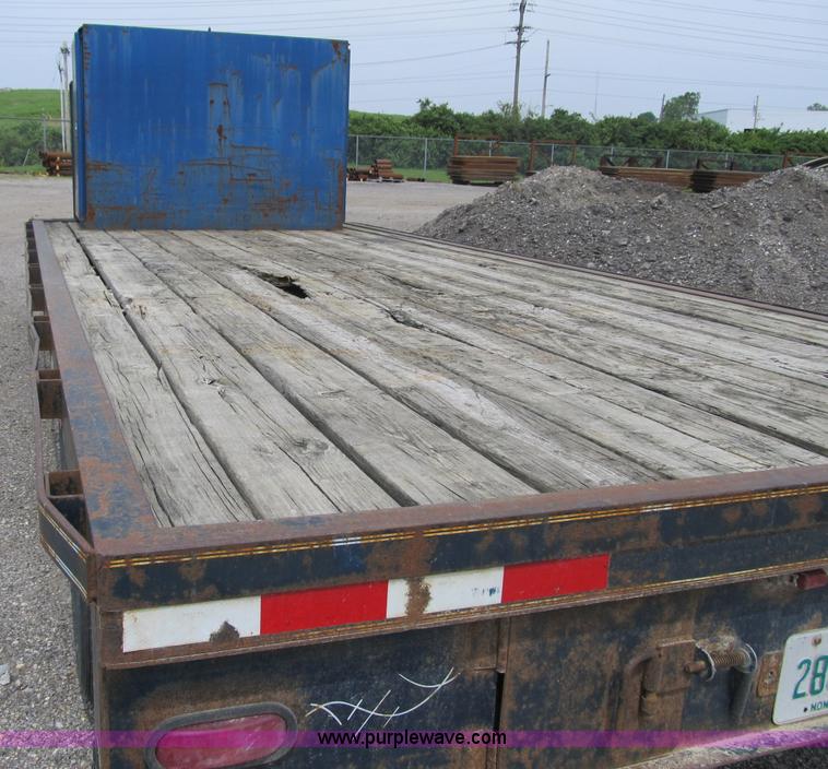 image for item 4147 1999 Trailerman ZT flatbed goose neck trailer