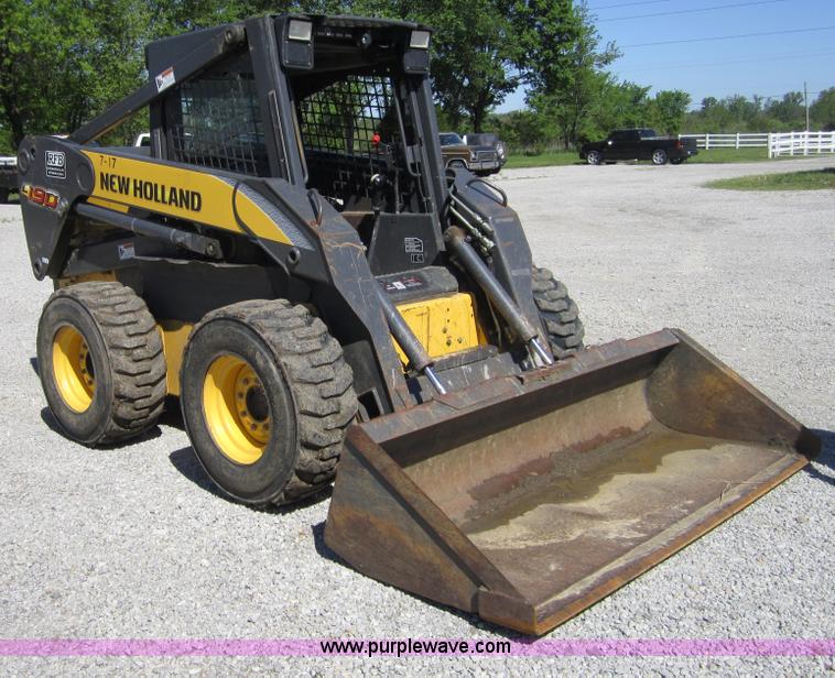 image for item 4386 2007 New Holland L190 skid steer super boom