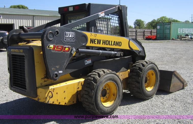 image for item 4386 2007 New Holland L190 skid steer super boom