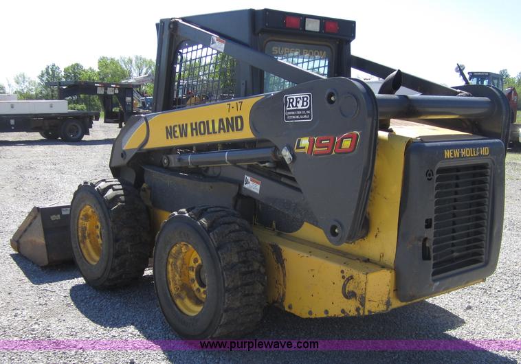 image for item 4386 2007 New Holland L190 skid steer super boom