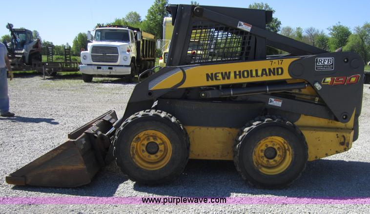 image for item 4386 2007 New Holland L190 skid steer super boom