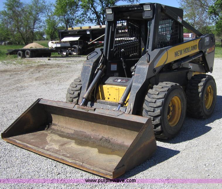 image for item 4386 2007 New Holland L190 skid steer super boom