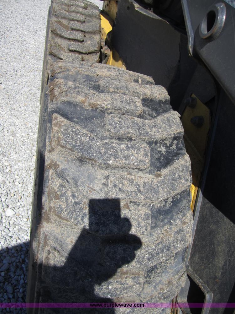 image for item 4386 2007 New Holland L190 skid steer super boom