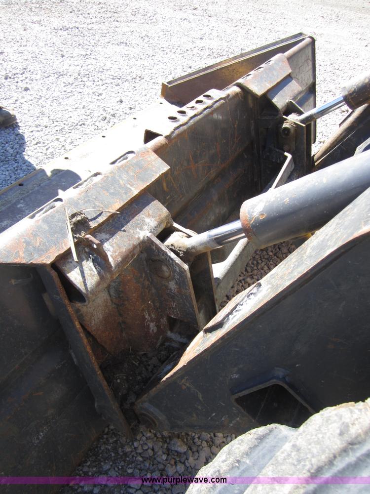 image for item 4386 2007 New Holland L190 skid steer super boom