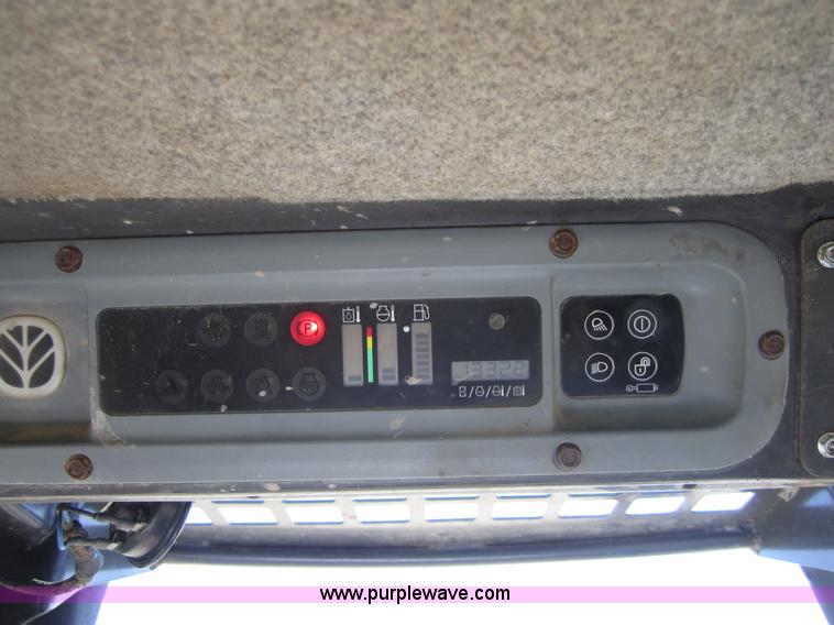 image for item 4386 2007 New Holland L190 skid steer super boom