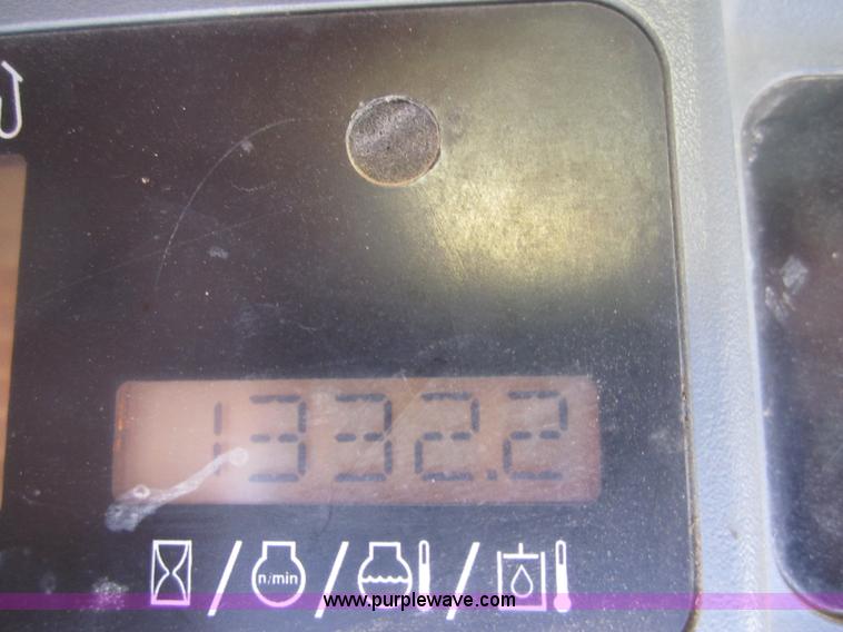 image for item 4386 2007 New Holland L190 skid steer super boom