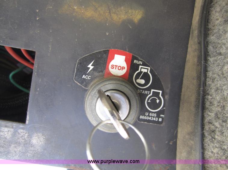 image for item 4386 2007 New Holland L190 skid steer super boom