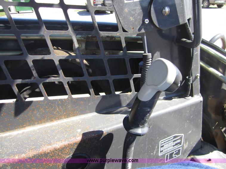 image for item 4386 2007 New Holland L190 skid steer super boom