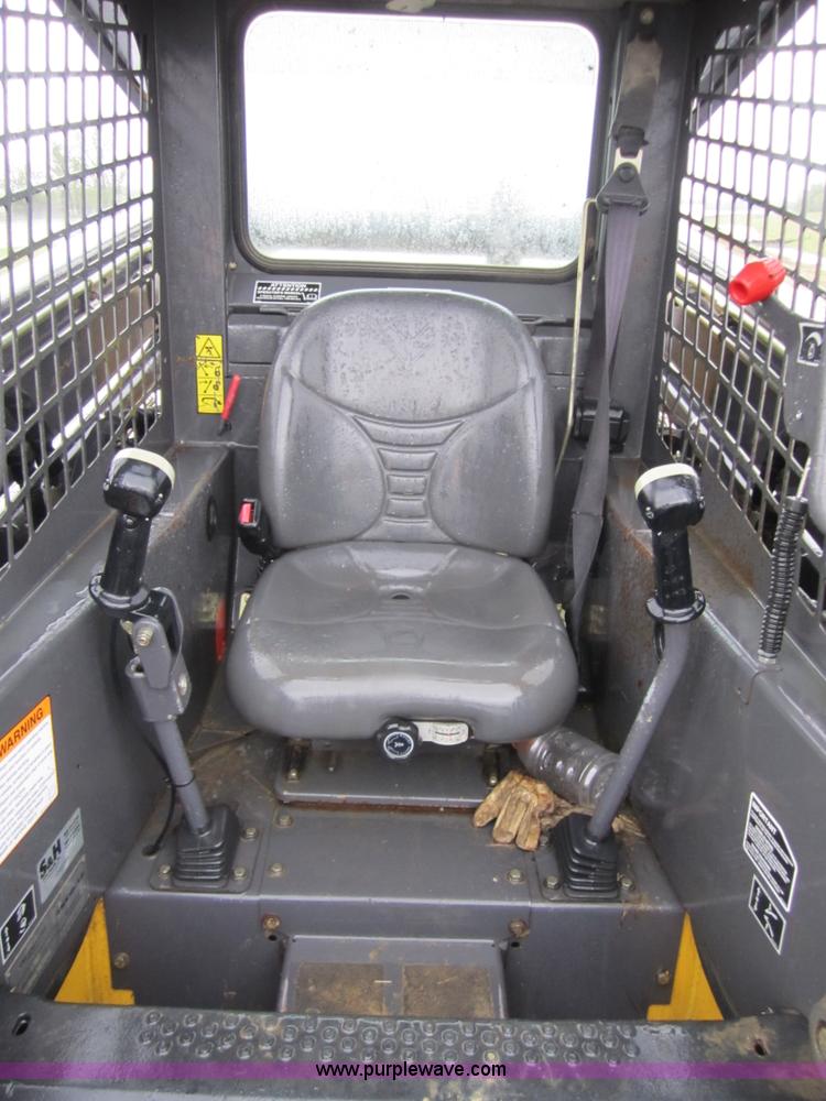 image for item 4386 2007 New Holland L190 skid steer super boom