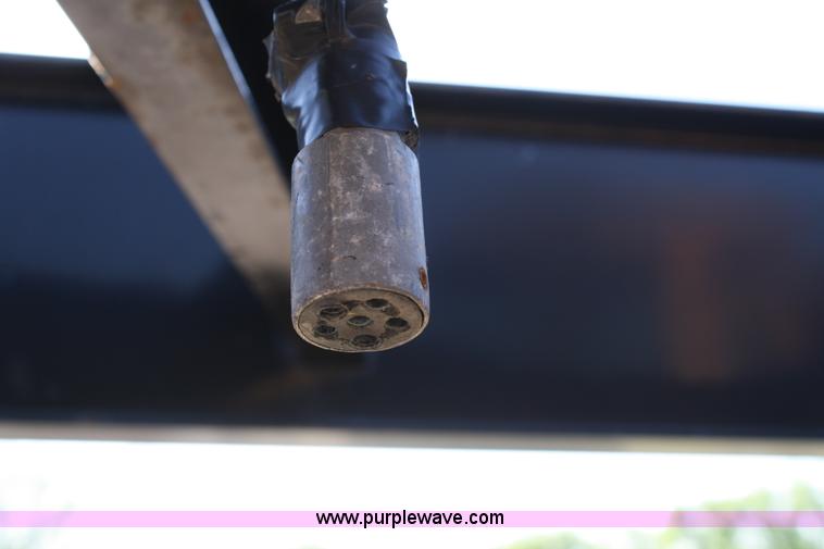 image for item 4723 2004 Blue Diamond goose neck flatbed trailer