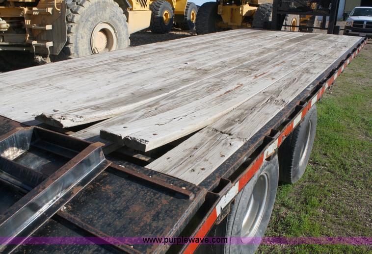 image for item 4723 2004 Blue Diamond goose neck flatbed trailer