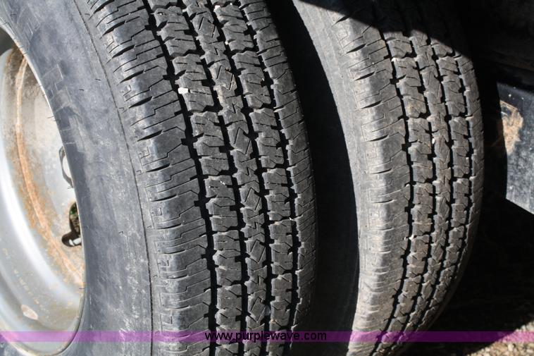 image for item 4723 2004 Blue Diamond goose neck flatbed trailer