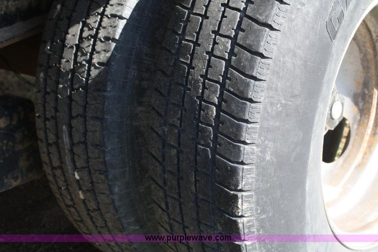 image for item 4723 2004 Blue Diamond goose neck flatbed trailer