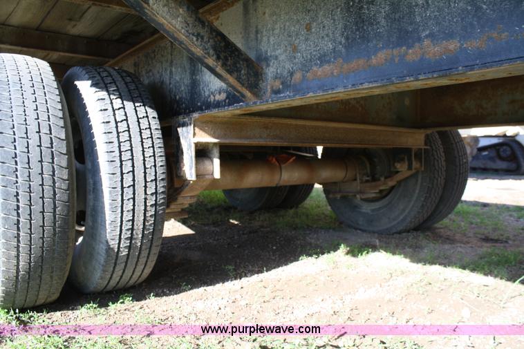 image for item 4723 2004 Blue Diamond goose neck flatbed trailer