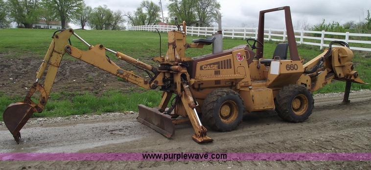 image for item 5437 Case 660 hoe and offset cable plow