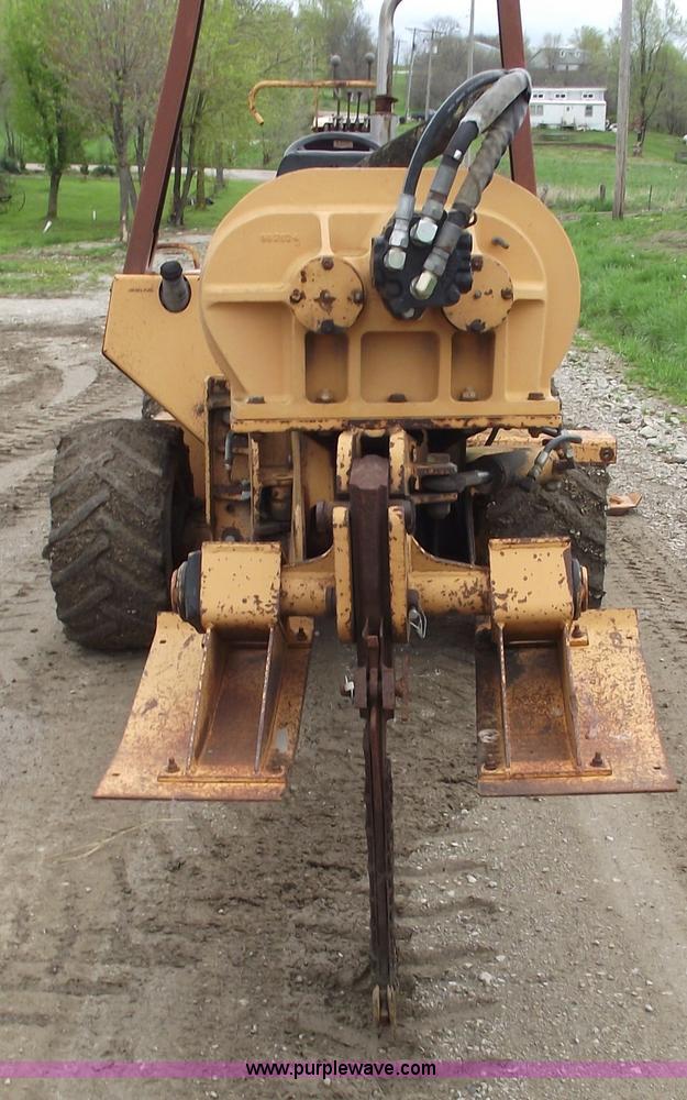image for item 5437 Case 660 hoe and offset cable plow