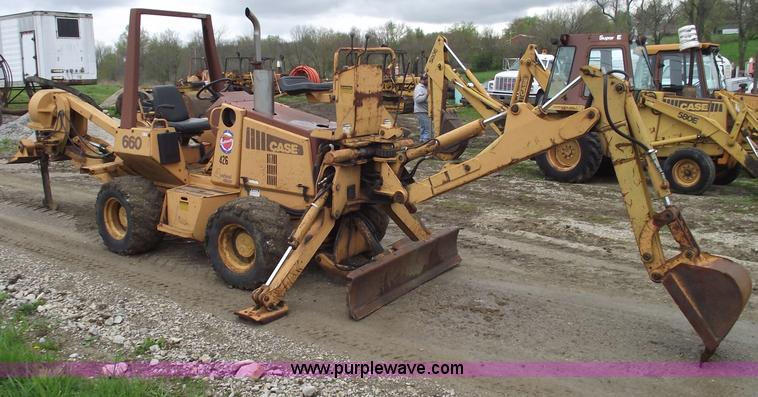 image for item 5437 Case 660 hoe and offset cable plow